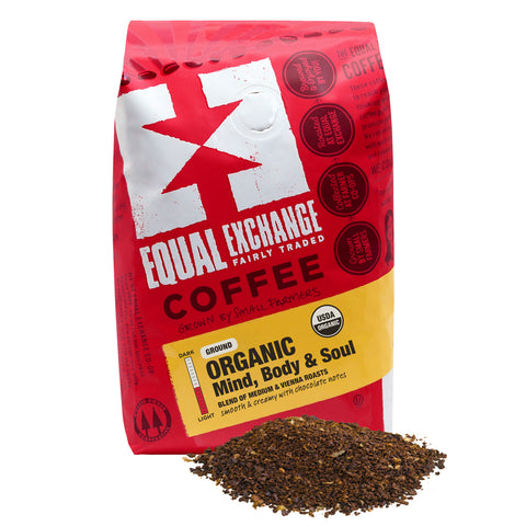 Organic Mind Body and Soul Ground Coffee bag with a pile of ground coffee